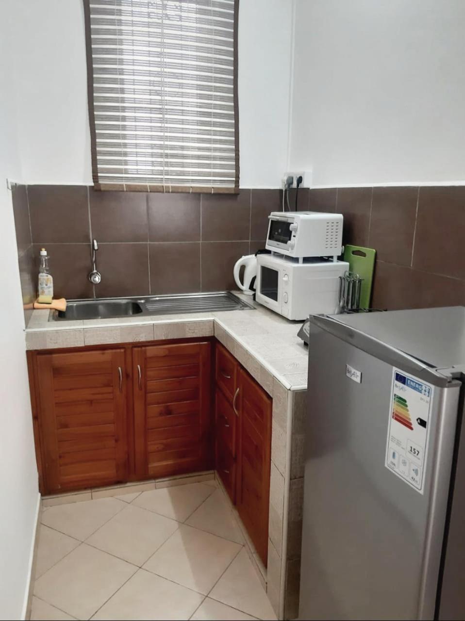 La Perla Holiday Apartments Pereybere Beach Quarto foto